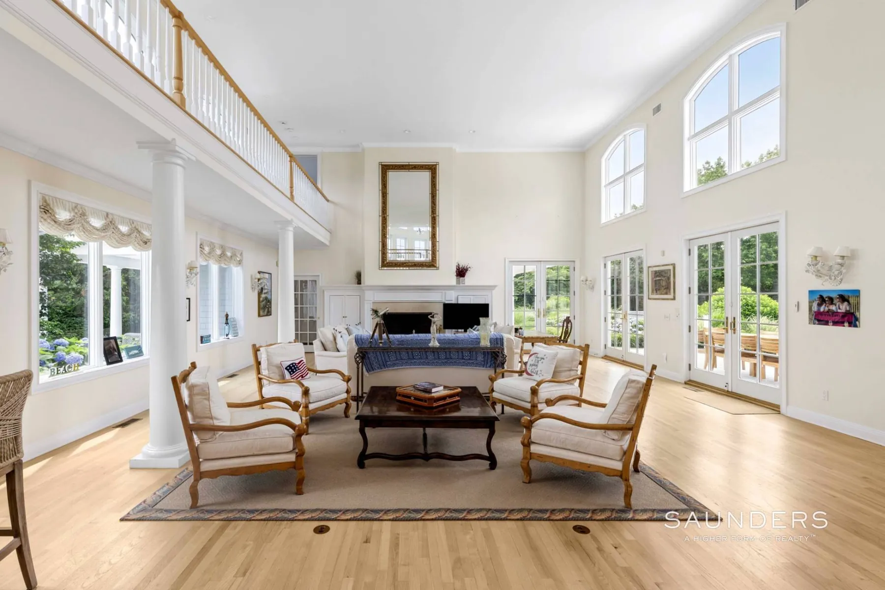 The double-height great room with fireplace